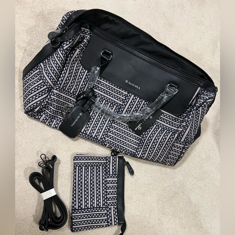 Brand NEW.  LIMITED EDITION MANAOLA LEXUS COLLAB travel duffle bag.